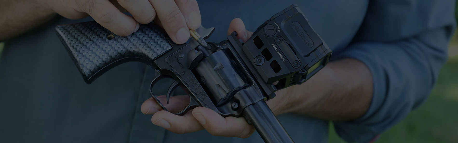 shooter loading CCI ammunition into a revolver