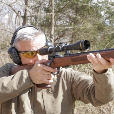 shooter aiming a rifle