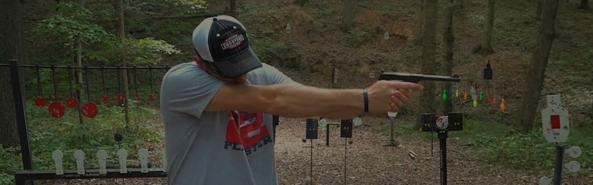 22plinkster aiming a pistol