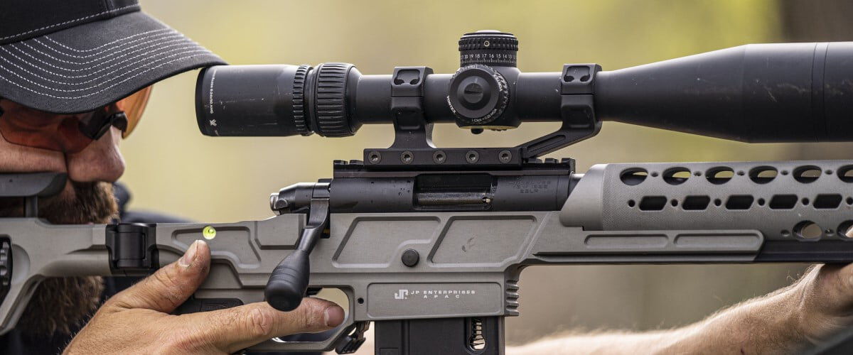 shooter looking down a rifle scope
