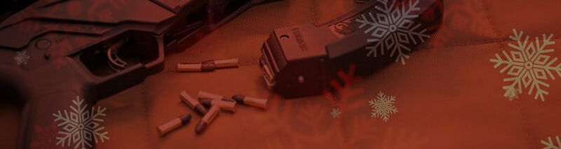 2 hunters crouching next to corn field