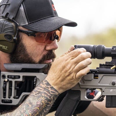 Josh Froelich aiming rifle