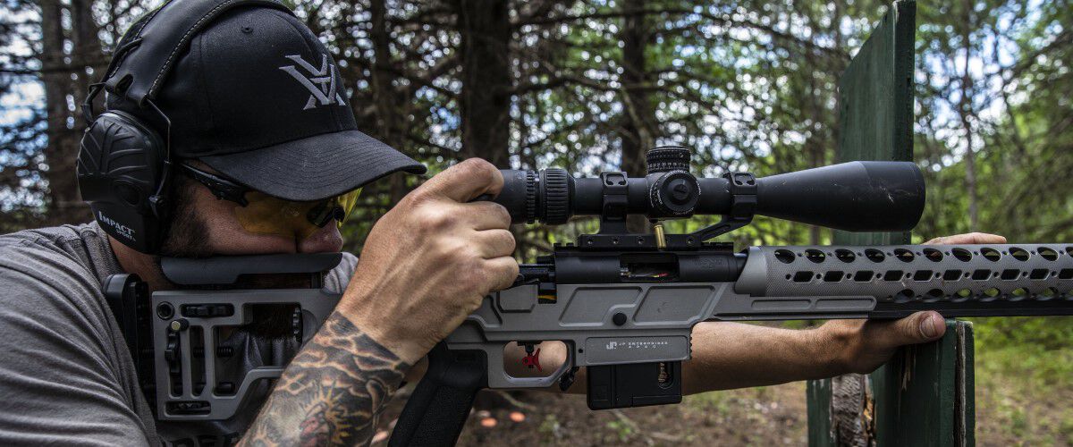 Josh Froelich shooting a rifle