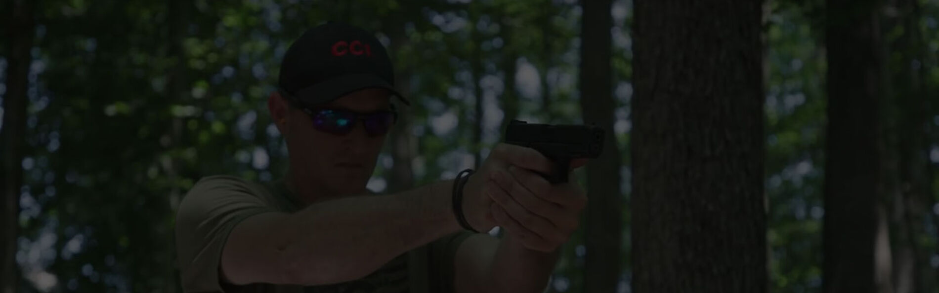 22plinkster looking down the scope of a rifle with a box of Uppercut on a table