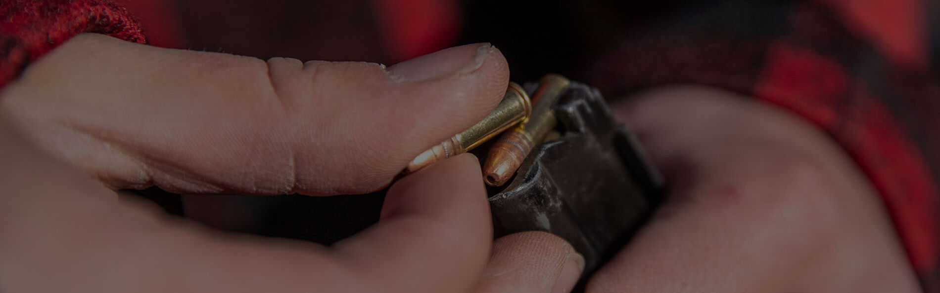 hunter loading CCI ammo into a magazine
