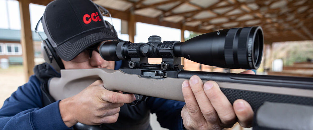 shooter aiming rifle