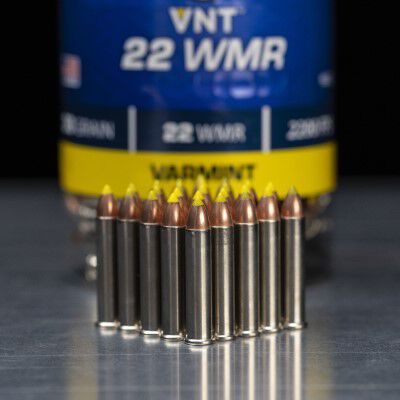 VNT 22 WMR cartridges standing in front of the product packaging