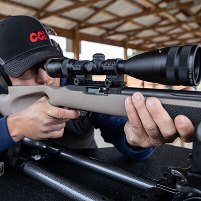 shooter aiming rifle