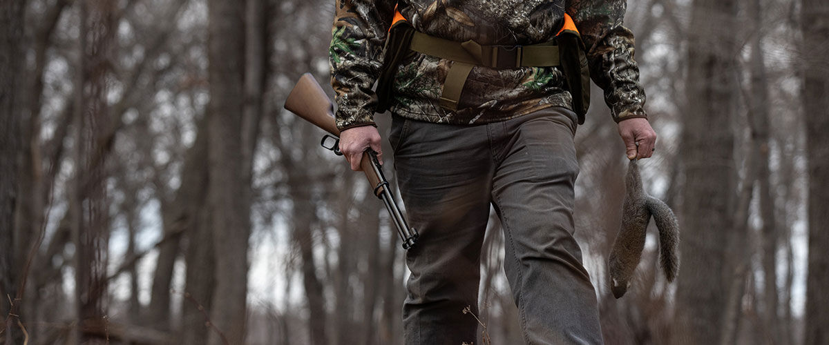 hunting carrying squirrel