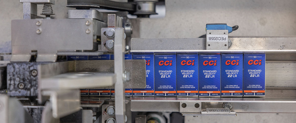 CCI Standard Velocity 22LR boxes on a converor belt