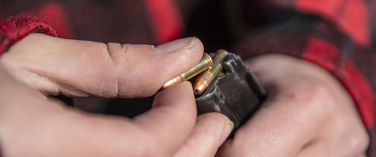 magazine being loaded with 22LR cartridges