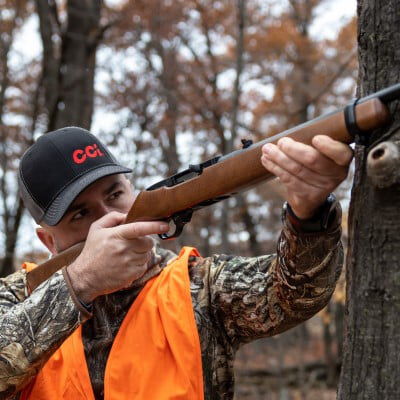 hunter looking down the iron sights of a rifle