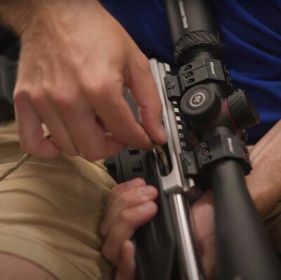 rimfire rifle being cleaned