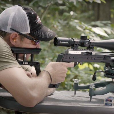22plinkster aiming a rifle