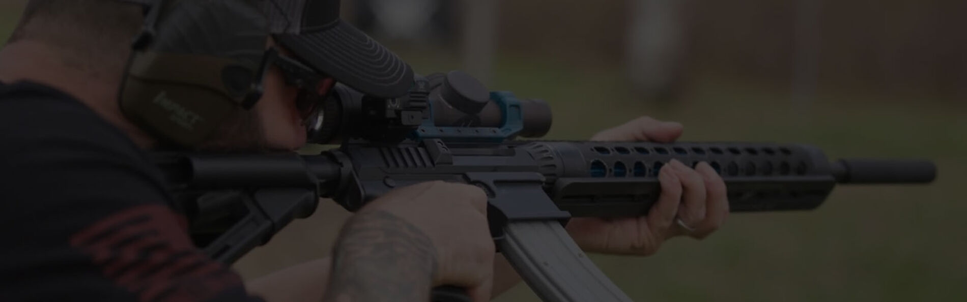 josh froelich shooting a supporessed rifle